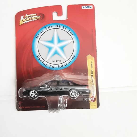 JOHNNY LIGHTNING  BEAT THE HEAT CAPT.  FRANK WOODS 1995 CHEVY CAPRICE NEW - Picture 1 of 7